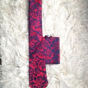 New in package tie, handkerchief and cuff links.